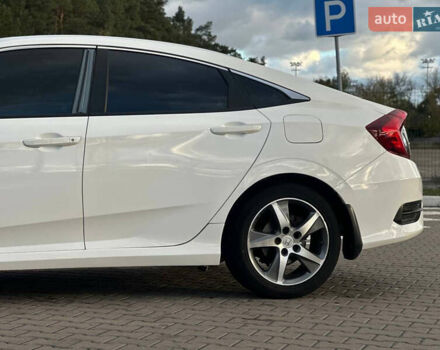 Белый Хонда Цивик, объемом двигателя 2 л и пробегом 153 тыс. км за 12950 $, фото 18 на Automoto.ua