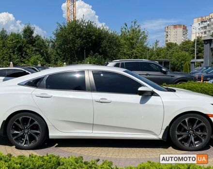 Белый Хонда Цивик, объемом двигателя 2 л и пробегом 174 тыс. км за 16400 $, фото 7 на Automoto.ua