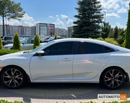 Белый Хонда Цивик, объемом двигателя 2 л и пробегом 174 тыс. км за 16400 $, фото 3 на Automoto.ua