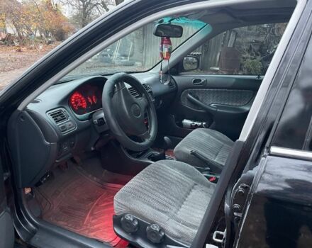 Черный Хонда Цивик, объемом двигателя 1.4 л и пробегом 355 тыс. км за 2800 $, фото 6 на Automoto.ua