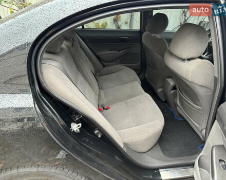 Черный Хонда Цивик, объемом двигателя 1.8 л и пробегом 328 тыс. км за 7000 $, фото 7 на Automoto.ua