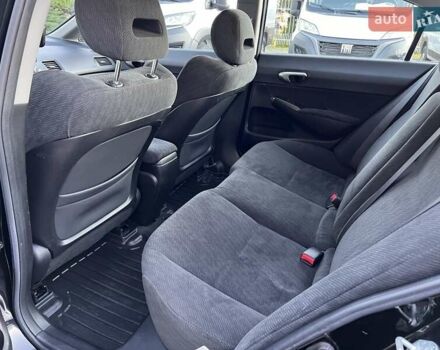 Черный Хонда Цивик, объемом двигателя 1.3 л и пробегом 297 тыс. км за 7999 $, фото 29 на Automoto.ua