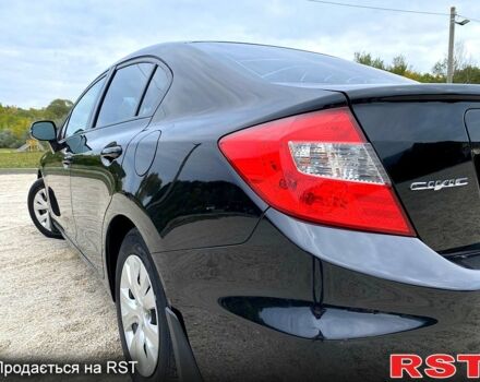 Черный Хонда Цивик, объемом двигателя 1.8 л и пробегом 230 тыс. км за 7700 $, фото 1 на Automoto.ua