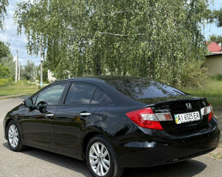 Чорний Хонда Сівік, об'ємом двигуна 1.8 л та пробігом 340 тис. км за 10300 $, фото 7 на Automoto.ua