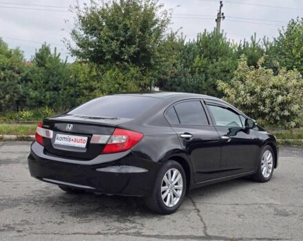 Хонда Цивик 2012 в Хмельницком на Automoto.ua Черный Хонда Цивик, объемом двигателя 1.8 л и пробегом 172 тыс. км за 9999 $, фото 2 на Automoto.ua