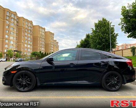 Черный Хонда Цивик, объемом двигателя 2 л и пробегом 118 тыс. км за 13700 $, фото 2 на Automoto.ua