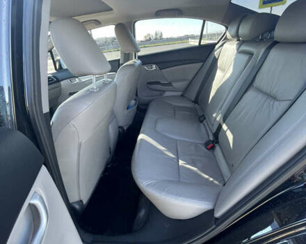 Черный Хонда Цивик, объемом двигателя 1.8 л и пробегом 126 тыс. км за 12000 $, фото 13 на Automoto.ua