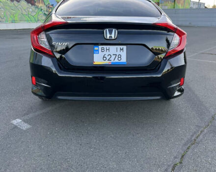 Черный Хонда Цивик, объемом двигателя 2 л и пробегом 129 тыс. км за 12300 $, фото 7 на Automoto.ua