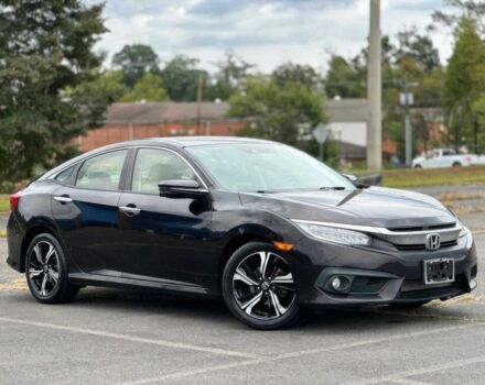 Черный Хонда Цивик, объемом двигателя 1.5 л и пробегом 47 тыс. км за 10000 $, фото 1 на Automoto.ua