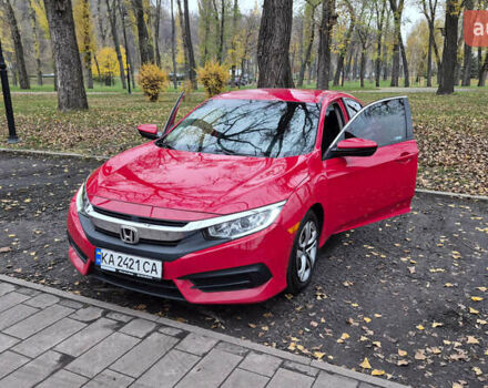 Красный Хонда Цивик, объемом двигателя 2 л и пробегом 119 тыс. км за 14400 $, фото 1 на Automoto.ua