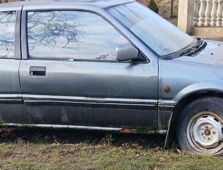 Серый Хонда Цивик, объемом двигателя 1.5 л и пробегом 200 тыс. км за 700 $, фото 1 на Automoto.ua