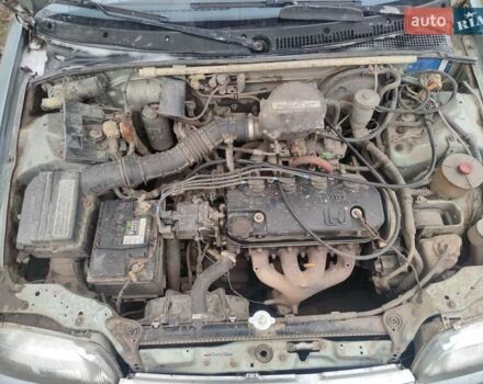 Серый Хонда Цивик, объемом двигателя 1.5 л и пробегом 250 тыс. км за 1418 $, фото 6 на Automoto.ua