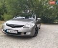 Серый Хонда Цивик, объемом двигателя 1.8 л и пробегом 243 тыс. км за 6600 $, фото 2 на Automoto.ua