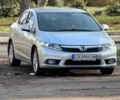 Сірий Хонда Сівік, об'ємом двигуна 1.8 л та пробігом 255 тис. км за 7929 $, фото 1 на Automoto.ua