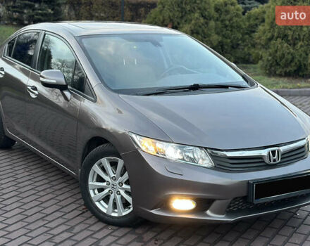 Серый Хонда Цивик, объемом двигателя 1.8 л и пробегом 226 тыс. км за 9500 $, фото 6 на Automoto.ua