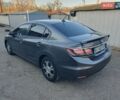Серый Хонда Цивик, объемом двигателя 1.49 л и пробегом 229 тыс. км за 8300 $, фото 1 на Automoto.ua