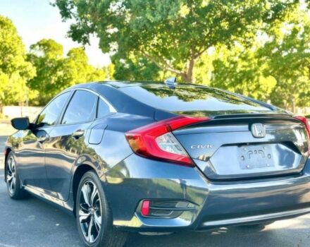 Серый Хонда Цивик, объемом двигателя 1.5 л и пробегом 57 тыс. км за 12650 $, фото 2 на Automoto.ua