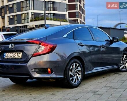 Серый Хонда Цивик, объемом двигателя 2 л и пробегом 147 тыс. км за 12400 $, фото 6 на Automoto.ua