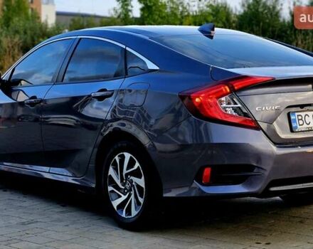 Серый Хонда Цивик, объемом двигателя 2 л и пробегом 147 тыс. км за 12400 $, фото 5 на Automoto.ua