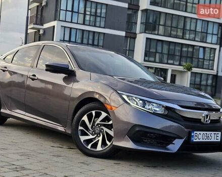 Серый Хонда Цивик, объемом двигателя 2 л и пробегом 147 тыс. км за 12400 $, фото 4 на Automoto.ua