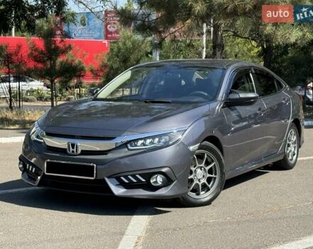 Сірий Хонда Сівік, об'ємом двигуна 2 л та пробігом 90 тис. км за 13799 $, фото 1 на Automoto.ua