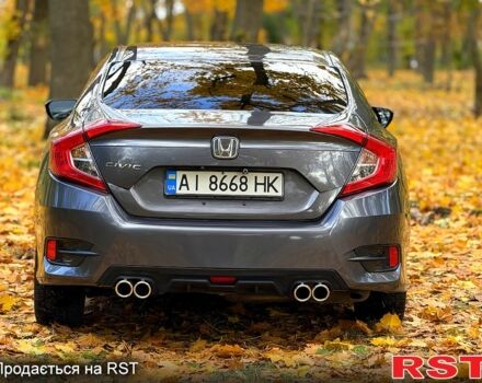 Серый Хонда Цивик, объемом двигателя 2 л и пробегом 117 тыс. км за 13750 $, фото 4 на Automoto.ua