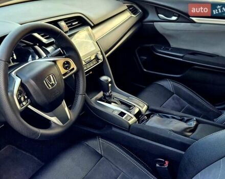 Серый Хонда Цивик, объемом двигателя 2 л и пробегом 147 тыс. км за 12400 $, фото 13 на Automoto.ua