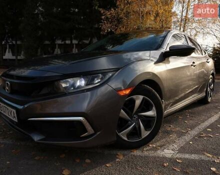 Серый Хонда Цивик, объемом двигателя 2 л и пробегом 80 тыс. км за 14000 $, фото 4 на Automoto.ua