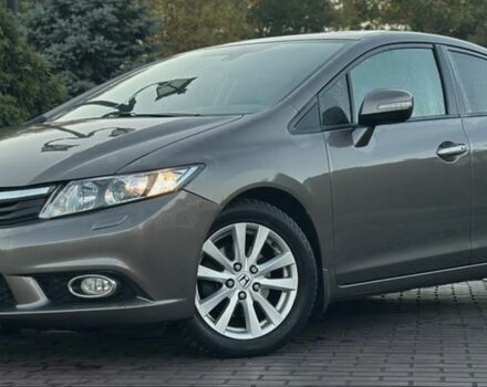 Серый Хонда Цивик, объемом двигателя 1.8 л и пробегом 225 тыс. км за 9200 $, фото 1 на Automoto.ua