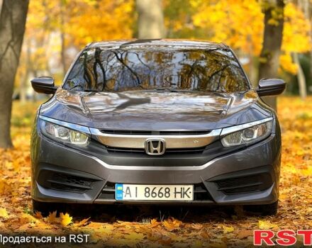 Серый Хонда Цивик, объемом двигателя 2 л и пробегом 117 тыс. км за 13750 $, фото 1 на Automoto.ua