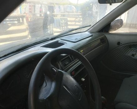 Синий Хонда Цивик, объемом двигателя 1.4 л и пробегом 80 тыс. км за 570 $, фото 2 на Automoto.ua