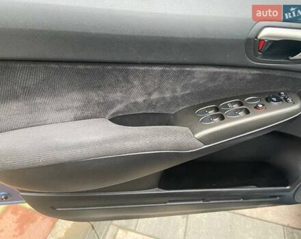 Синий Хонда Цивик, объемом двигателя 1.8 л и пробегом 170 тыс. км за 7300 $, фото 13 на Automoto.ua