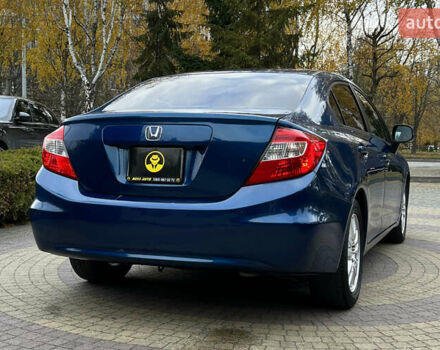 Синий Хонда Цивик, объемом двигателя 1.8 л и пробегом 219 тыс. км за 6800 $, фото 6 на Automoto.ua