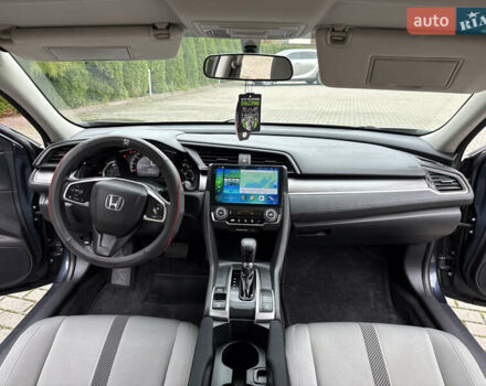 Синий Хонда Цивик, объемом двигателя 2 л и пробегом 148 тыс. км за 12700 $, фото 23 на Automoto.ua