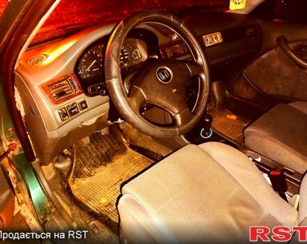 Зеленый Хонда Цивик, объемом двигателя 1.5 л и пробегом 332 тыс. км за 1800 $, фото 3 на Automoto.ua