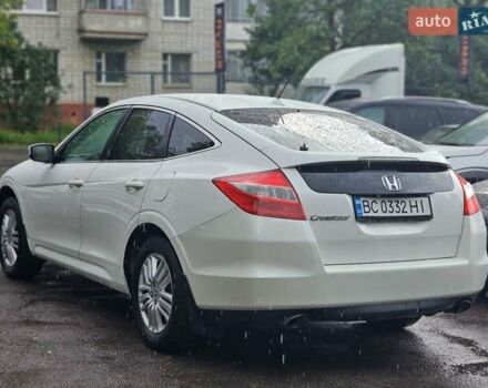 Белый Хонда Кросстур, объемом двигателя 2.4 л и пробегом 238 тыс. км за 9200 $, фото 2 на Automoto.ua