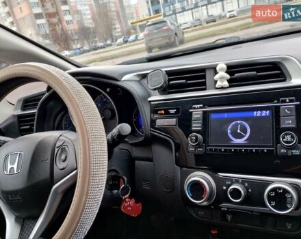 Белый Хонда ФИТ, объемом двигателя 1.5 л и пробегом 49 тыс. км за 11800 $, фото 8 на Automoto.ua