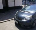 Черный Хонда ФИТ, объемом двигателя 1.4 л и пробегом 138 тыс. км за 4000 $, фото 1 на Automoto.ua
