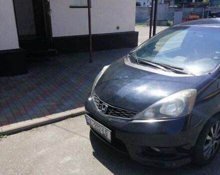 Черный Хонда ФИТ, объемом двигателя 1.4 л и пробегом 138 тыс. км за 4000 $, фото 1 на Automoto.ua
