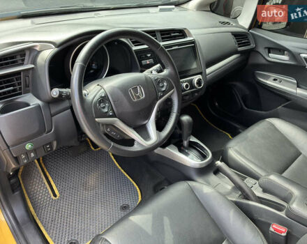 Желтый Хонда ФИТ, объемом двигателя 1.5 л и пробегом 135 тыс. км за 12500 $, фото 24 на Automoto.ua