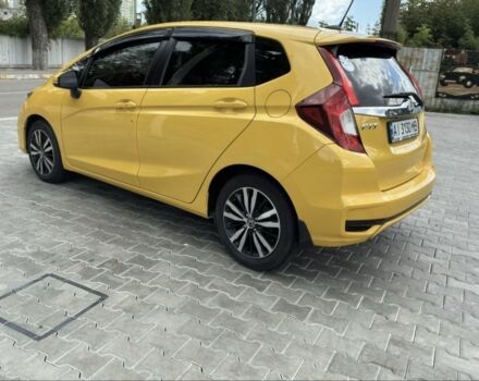 Желтый Хонда ФИТ, объемом двигателя 1.5 л и пробегом 136 тыс. км за 12000 $, фото 1 на Automoto.ua