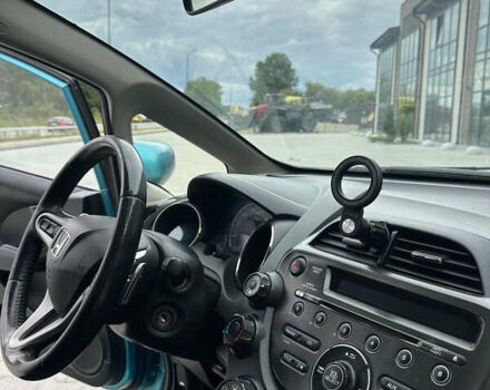 Синий Хонда ФИТ, объемом двигателя 1.5 л и пробегом 223 тыс. км за 7099 $, фото 12 на Automoto.ua