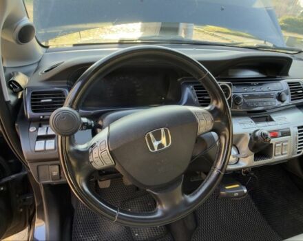 Черный Хонда ФРВ, объемом двигателя 1.8 л и пробегом 300 тыс. км за 7500 $, фото 9 на Automoto.ua