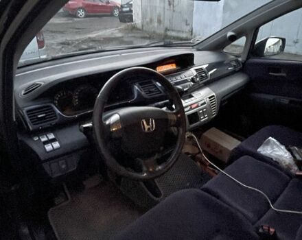 Черный Хонда ФРВ, объемом двигателя 1.8 л и пробегом 200 тыс. км за 6100 $, фото 4 на Automoto.ua