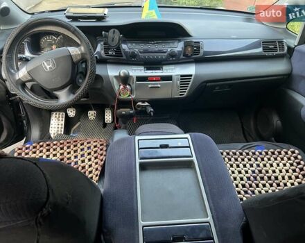 Черный Хонда ФРВ, объемом двигателя 1.8 л и пробегом 213 тыс. км за 7399 $, фото 6 на Automoto.ua