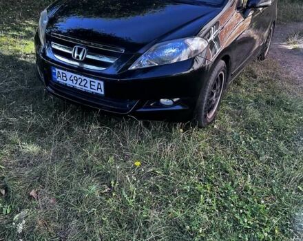 Черный Хонда ФРВ, объемом двигателя 1.8 л и пробегом 213 тыс. км за 7399 $, фото 1 на Automoto.ua