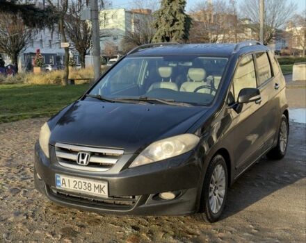 Черный Хонда ФРВ, объемом двигателя 1.8 л и пробегом 300 тыс. км за 7500 $, фото 1 на Automoto.ua