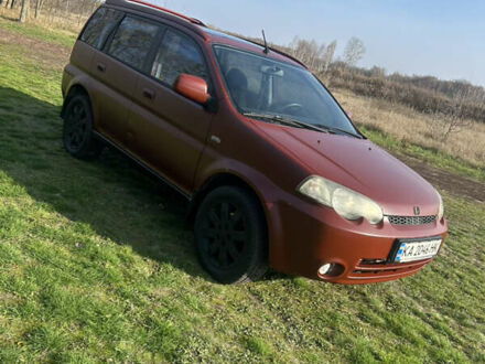 Красный Хонда ХРВ, объемом двигателя 1.6 л и пробегом 206 тыс. км за 4400 $, фото 1 на Automoto.ua