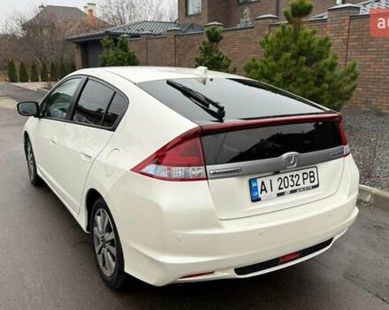 Білий Хонда Інсайт, об'ємом двигуна 1.34 л та пробігом 175 тис. км за 8000 $, фото 4 на Automoto.ua