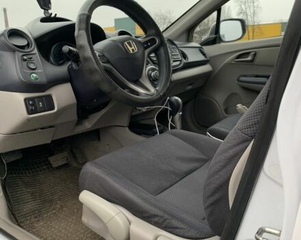 Білий Хонда Інсайт, об'ємом двигуна 1.3 л та пробігом 297 тис. км за 6600 $, фото 4 на Automoto.ua